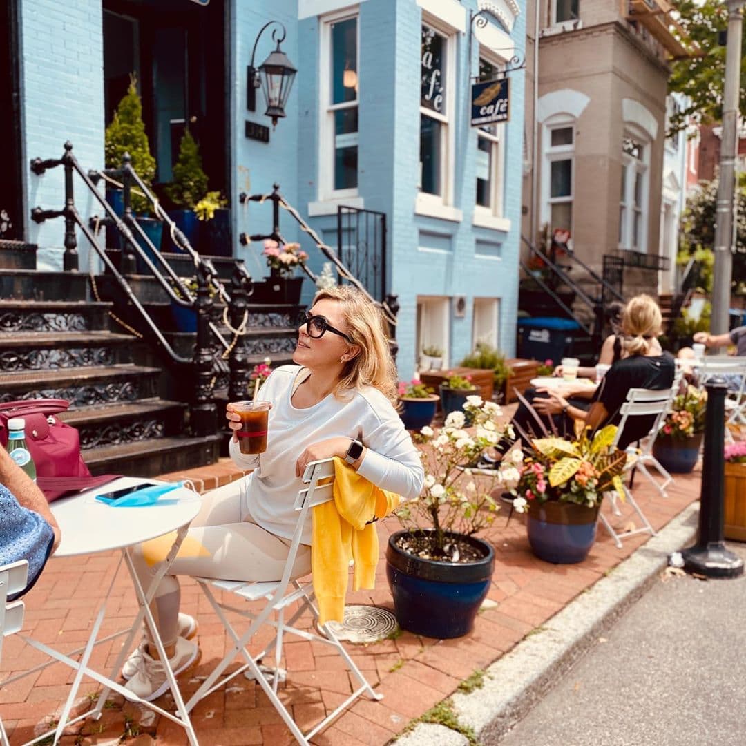 Outdoor sidewalk seating on N Street NW in front of Georgetown row houses — Café Georgetown